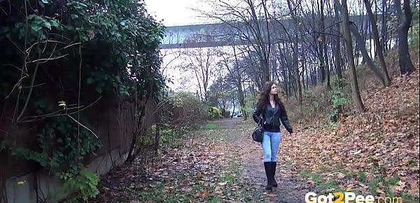 Shy Brunette Tries Public Pissing